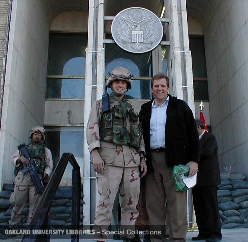 Mike Rogers with a soldier in Afghanistan, 2002
